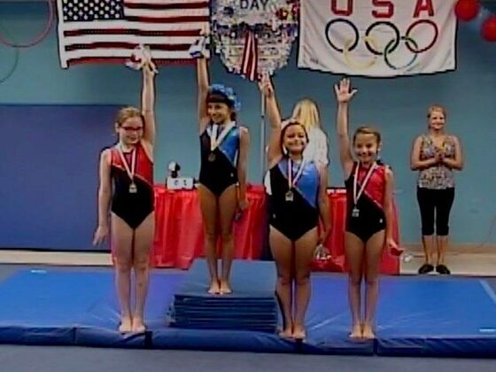 Champions celebrating on the podium