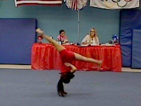 A handstand in front of the judges