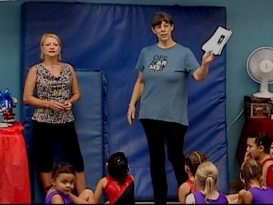 Olga Korbut and Coach Robin with the gymnasts