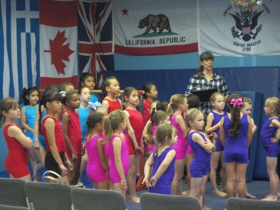 Coach Robin with her gymnasts before the competition