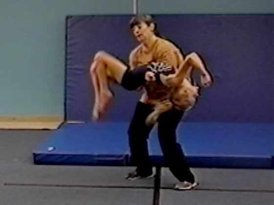 Coach Robin guiding a back bend
