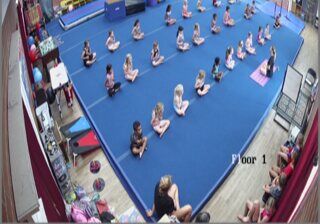 The youngest class warming up on the spring floor