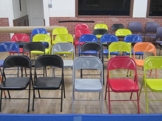 Chairs set out for families before a show