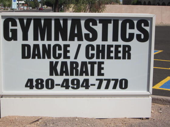 The Tumble Masters sign on Granite Reef Road