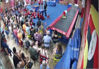 Families fill the gym for a show, 2023